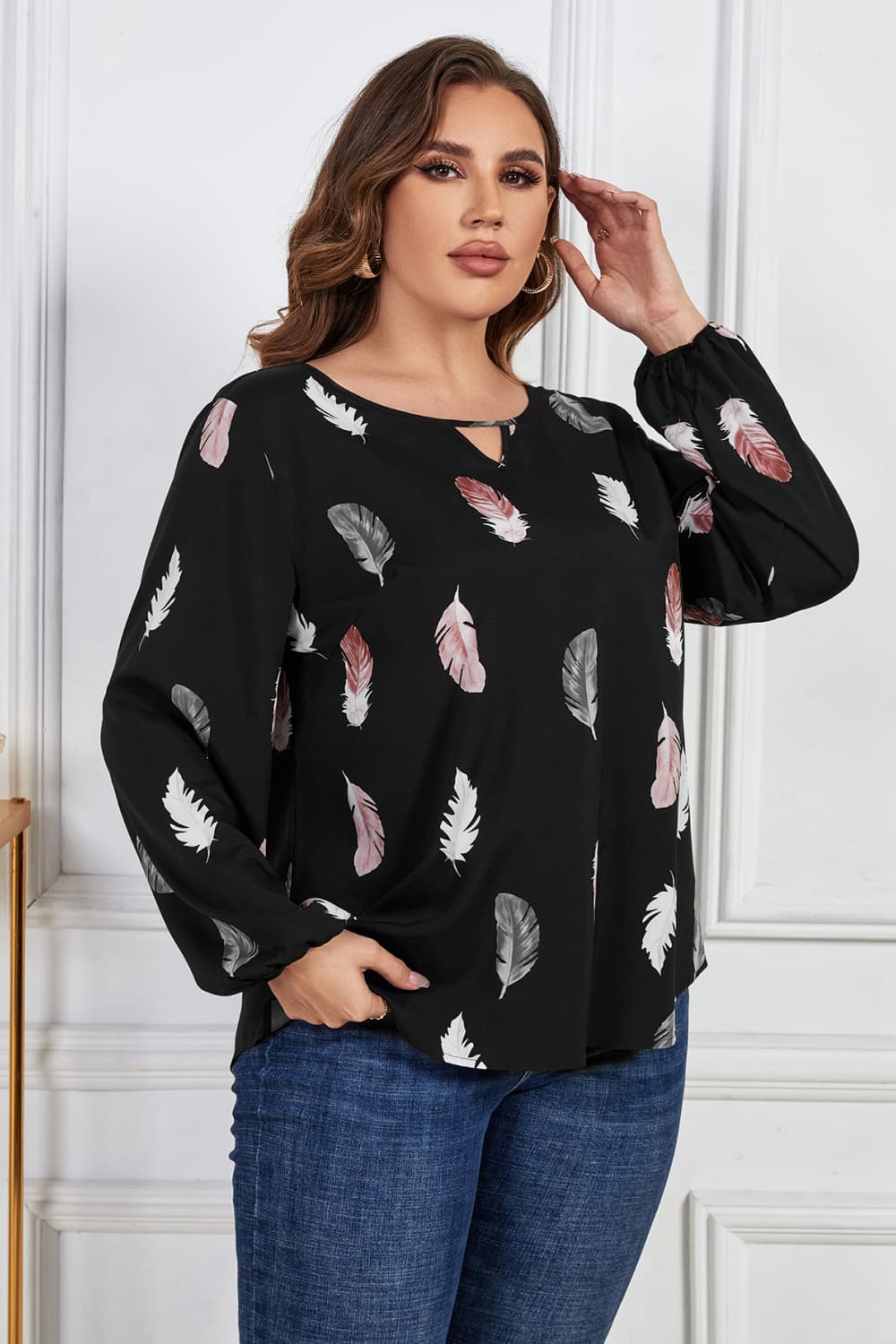 Melo Apparel Plus Size Printed Round Neck Long Sleeve Cutout Blouse