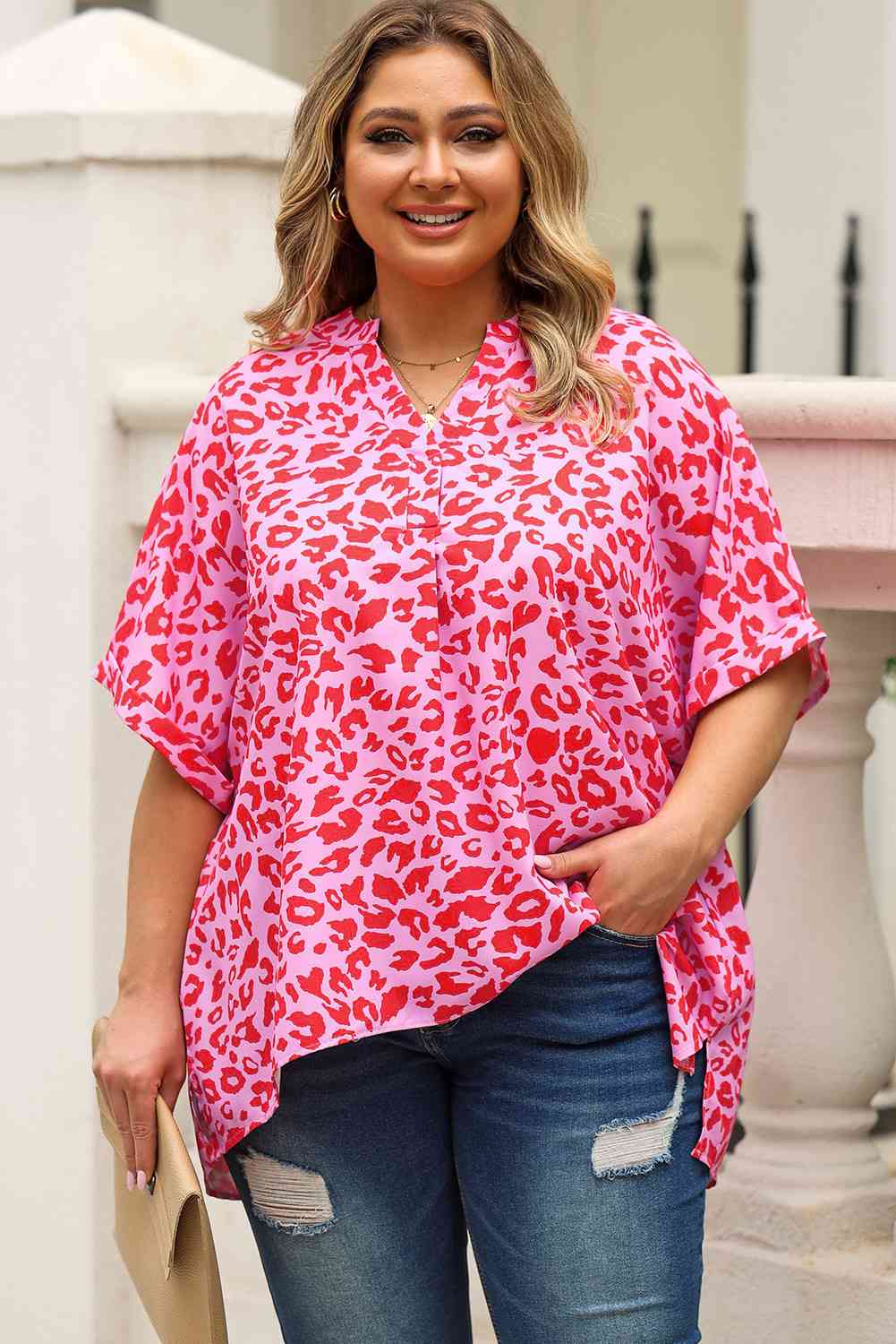 Plus Size Printed Notched Neck Half Sleeve Top